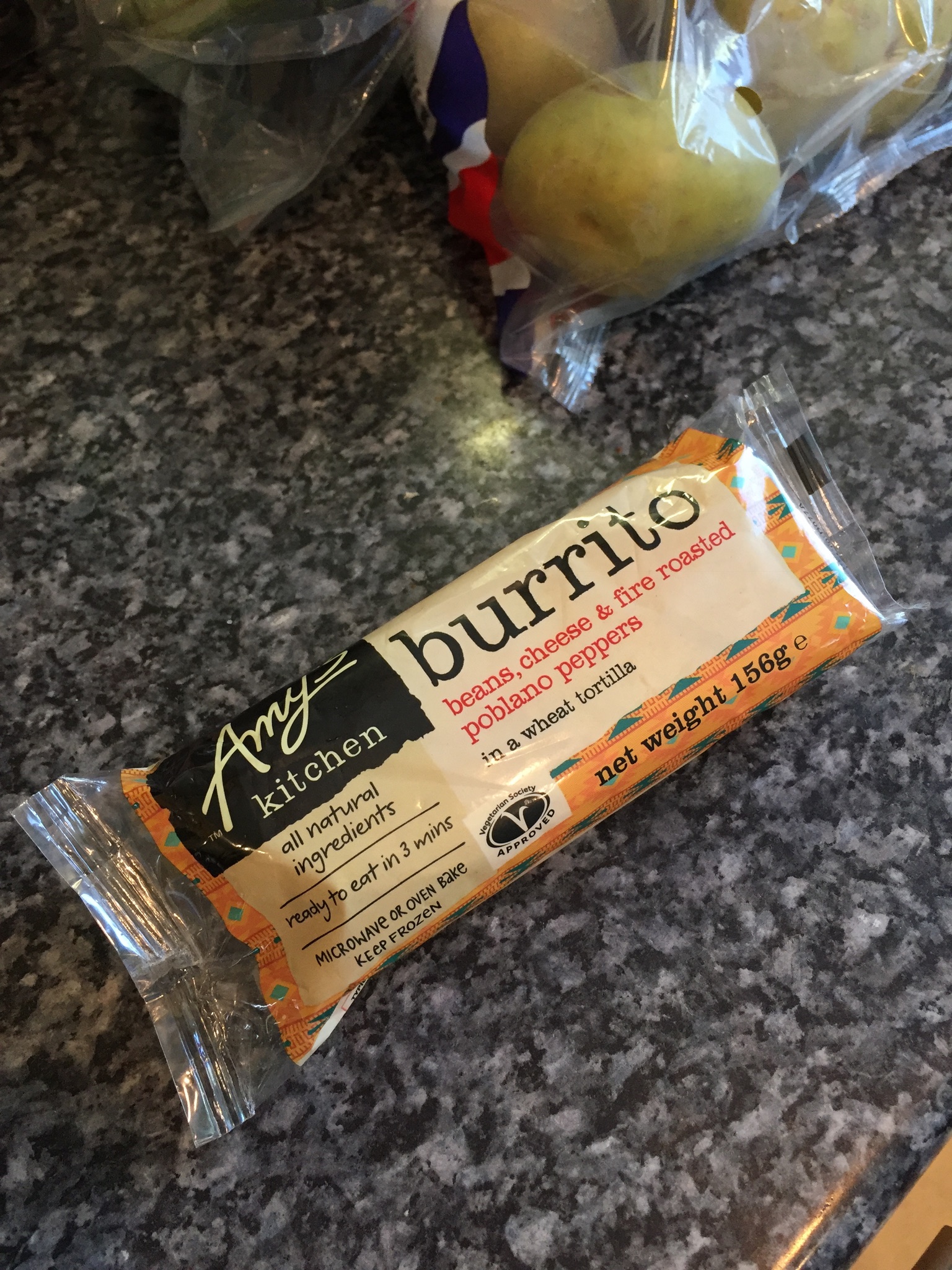 A prepackaged, microwave/oven-cookable veggie burrito. Beans, cheese & roasted peppers.