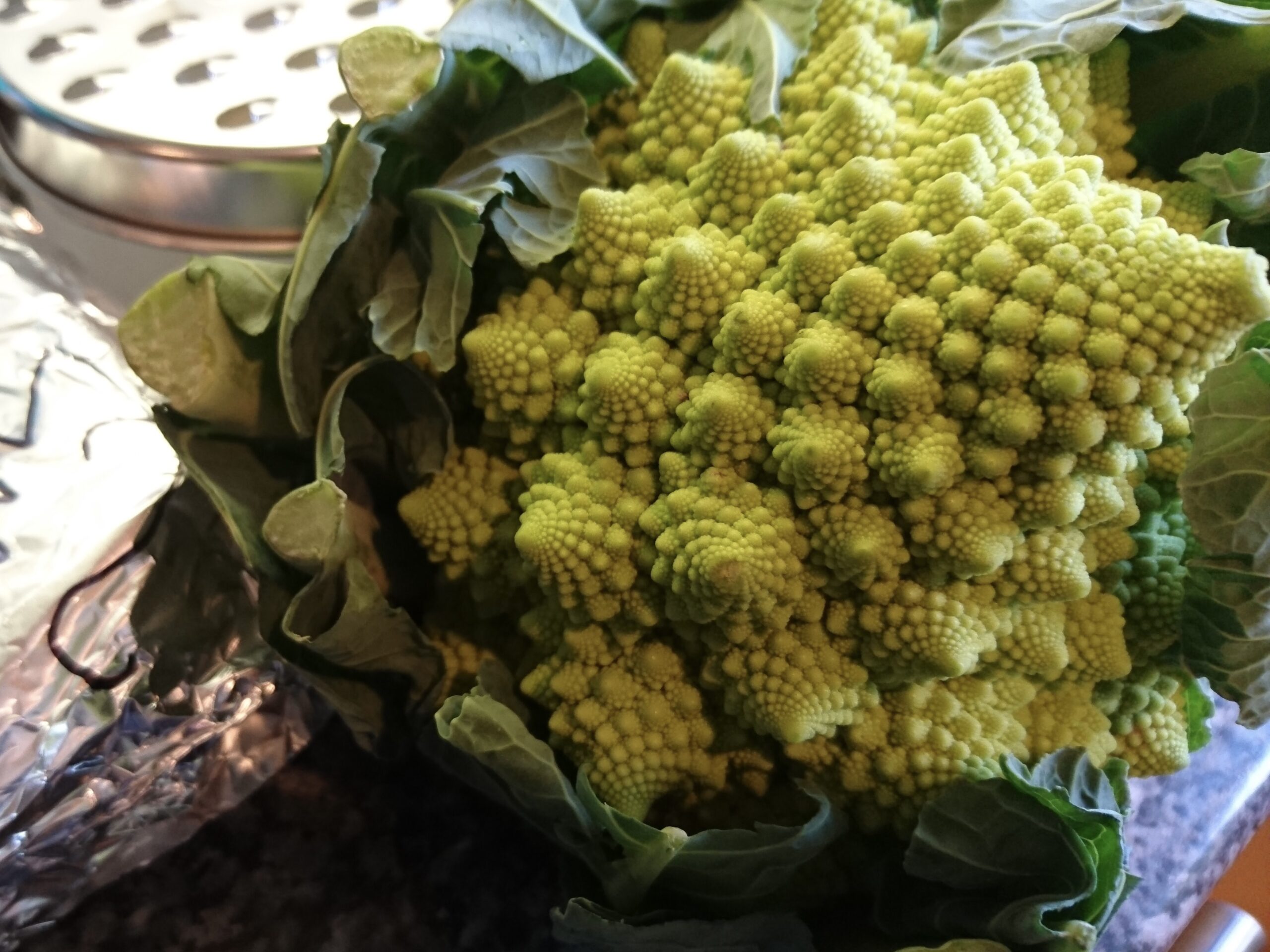 A poorly-framed photo of a Romanesco cauliflower to illustrate a Fibonacci-like spiral. Photo: the author.