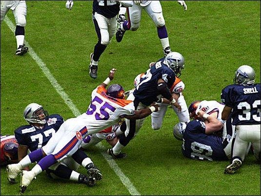 My low-resolution photo taken around a quarter of a century ago, of the Scottish Claymores NFL Europe team (blue and silver) playing the Frankfurt Galaxy (not blue and silver).